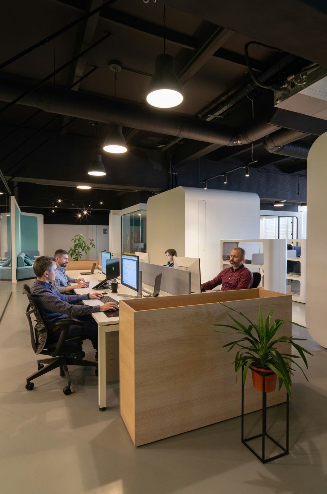 Modern office space with team members working